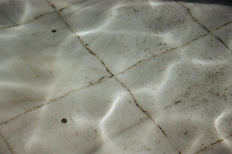 remove dried grout from tile